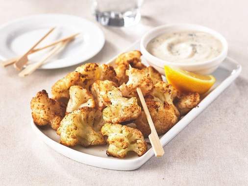 Indian style roasted cauliflower bites with tahini and cilantro sauce